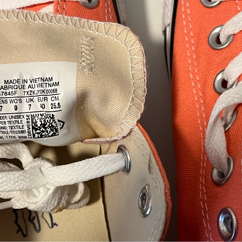 Salmon color Converse shoes